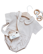 Various baby products displayed on a homepage, including clothing, toys, and accessories.
